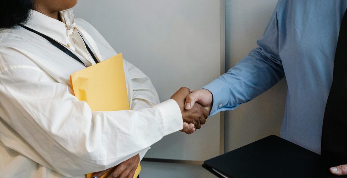 a man and woman shaking hands