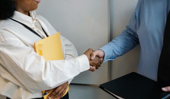 a man and woman shaking hands